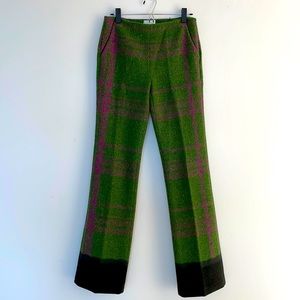 Wool pant European size 42 with side zipper. Lining is ripped.